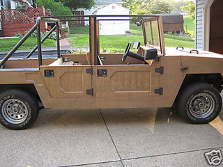 Illustration for article titled "Happy Jack" Wooden Hummer Replica A Questionable Off-Roader